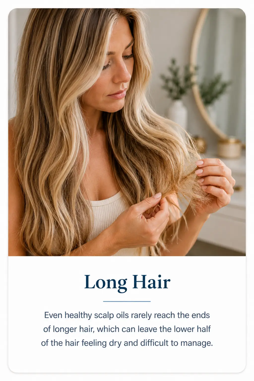 Woman examining dry ends of long blonde hair while scalp oils remain concentrated near the roots